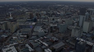 6.7K aerial stock footage of tilting from freeway to reveal and approach the Georgia State Capitol in Downtown Atlanta at sunset Aerial Stock Footage | AX0171_0156