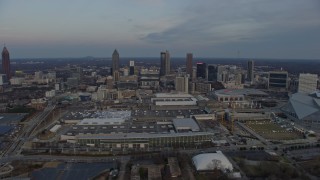 AX0171_0163 - 6.7K aerial stock footage of the Downtown Atlanta skyline at sunset, seen from near the stadium, Georgia