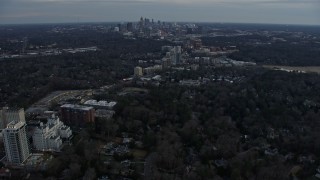 6.7K aerial stock footage of the Midtown Atlanta skyline seen from Buckhead at sunset, Atlanta, Georgia Aerial Stock Footage | AX0171_0181