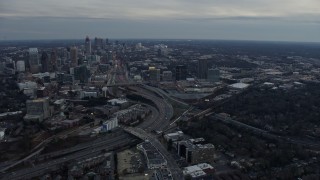 6.7K aerial stock footage of flying toward Midtown Atlanta and freeway at sunset, Atlanta, Georgia Aerial Stock Footage | AX0171_0182