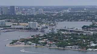 6.7K aerial stock footage of approaching a bridge over the Stranahan River in Fort Lauderdale, Florida Aerial Stock Footage | AX0172_042