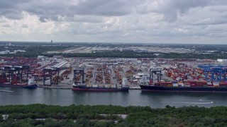 6.7K aerial stock footage of cargo ships at Port Everglades, Florida Aerial Stock Footage | AX0172_066