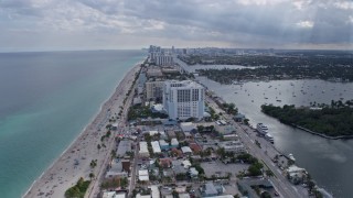 AX0172_069 - 6.7K aerial stock footage of a wide view of beachfront hotels and condos in Hollywood, Florida