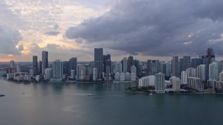 6.7K aerial stock footage approach the Downtown Miami skyline and Brickell Key, Florida at sunset Aerial Stock Footage | AX0172_165