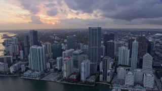 6.7K aerial stock footage flyby skyscrapers and reveal the river in Downtown Miami, Florida at sunset Aerial Stock Footage | AX0172_172