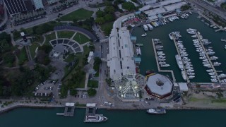 6.7K aerial stock footage tilt from Bayfront Park and the marina to reveal skyscrapers in Downtown Miami, Florida at sunset Aerial Stock Footage | AX0172_173