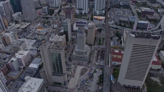 6.7K aerial stock footage reverse view of courthouse and high-rise apartment buildings at sunset, Miami, Florida Aerial Stock Footage | AX0172_183