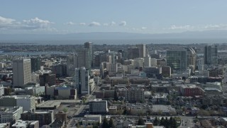 6K aerial stock footage of flying past downtown office buildings in Oakland, California Aerial Stock Footage | AX0173_0024