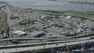 6K aerial stock footage of a water treatment plant in Oakland, California Aerial Stock Footage | AX0173_0026