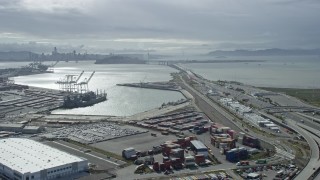 6K aerial stock footage of approaching the Bay Bridge and 80 freeway in Oakland, California Aerial Stock Footage | AX0173_0027