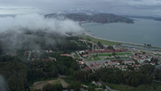 AX0173_0051 - 6K aerial stock footage flyby office buildings and studios at The Presidio in San Francisco, California