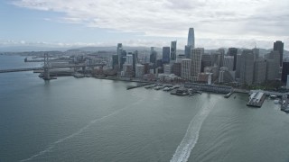 6K aerial stock footage of flying away from skyscrapers in Downtown San Francisco, California Aerial Stock Footage | AX0173_0069