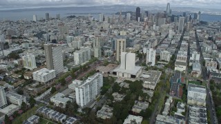 AX0173_0079 - 6K aerial stock footage the city's skyline seen from cathedral in Western Addition, San Francisco, California