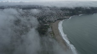 AX0173_0092 - 6K aerial stock footage of approaching the Outer Richmond District from Baker Beach, San Francisco, California