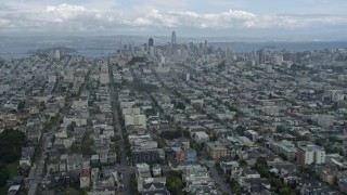 6K aerial stock footage fly through fog to reveal the San Francisco skyline, California Aerial Stock Footage | AX0173_0094