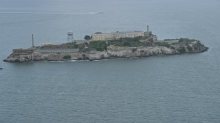 AX0173_0102 - 6K aerial stock footage of flying past Alcatraz, California