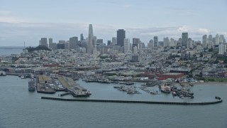 6K aerial stock footage of the San Francisco skyline seen from Fisherman's Wharf, California Aerial Stock Footage | AX0173_0103