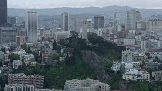 6K aerial stock footage of flying past the famous Coit Tower in North Beach, San Francisco, California Aerial Stock Footage | AX0173_0107