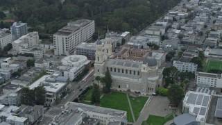 6K aerial stock footage orbit St. Ignatius Church in the Inner Richmond District, San Francisco, California Aerial Stock Footage | AX0173_0120