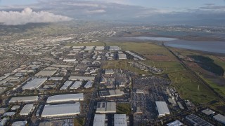 6K aerial stock footage of flying over Fremont warehouse buildings, California Aerial Stock Footage | AX0174_0015