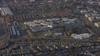 6K aerial stock footage of a reverse view of a prison complex in Milpitas, California Aerial Stock Footage | AX0174_0021