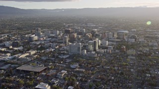 AX0174_0022 - 6K aerial stock footage of approaching and flying by Downtown San Jose, California