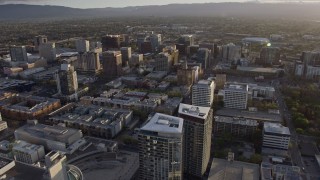 6K aerial stock footage of office and apartment buildings in Downtown San Jose at sunset, California Aerial Stock Footage | AX0174_0026