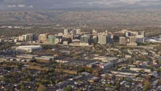 6K aerial stock footage of a static view of Downtown San Jose at sunset, California Aerial Stock Footage | AX0174_0036