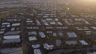 6K aerial stock footage of warehouse and office buildings at sunset, San Jose, California Aerial Stock Footage | AX0174_0044