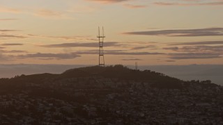 AX0174_0076 - 6K aerial stock footage of Sutro Tower at sunset, San Francisco, California