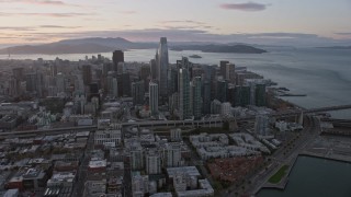 6K aerial stock footage of flying by the San Francisco skyline at sunset, California Aerial Stock Footage | AX0174_0081