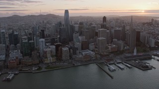 6K aerial stock footage of passing by Downtown San Francisco at sunset, California Aerial Stock Footage | AX0174_0083