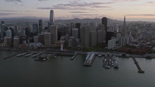 6K aerial stock footage flyby Downtown San Francisco skyscrapers at sunset, California Aerial Stock Footage | AX0174_0084