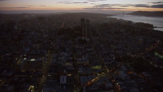 6K aerial stock footage of flying toward apartment buildings in Russian Hill at twilight, San Francisco, California Aerial Stock Footage | AX0174_0123