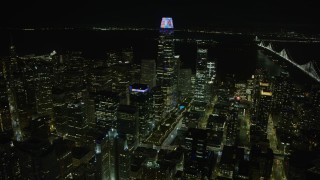 6K aerial stock footage approach and flyby Salesforce Tower at night, Downtown San Francisco, California Aerial Stock Footage | AX0174_0144