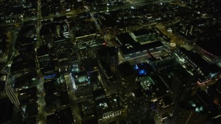 6K aerial stock footage of office buildings and Moscone Center at night in Downtown San Francisco, California Aerial Stock Footage | AX0174_0149