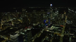 6K aerial stock footage approach Downtown San Francisco skyscrapers at night, California Aerial Stock Footage | AX0174_0157