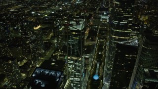 6K aerial stock footage of flying past a skyscraper in Downtown San Francisco at night, California Aerial Stock Footage | AX0174_0164