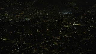 6K aerial stock footage of passing Nob Hill apartment and office buildings at night, San Francisco, California Aerial Stock Footage | AX0174_0170