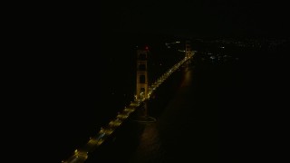 6K aerial stock footage of light traffic on the Golden Gate Bridge at night, California Aerial Stock Footage | AX0174_0177