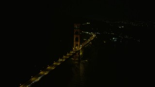 6K aerial stock footage of light traffic on the Marin side of Golden Gate Bridge at night, California Aerial Stock Footage | AX0174_0178