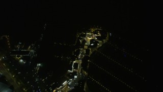 AX0174_0193 - 6K aerial stock footage of a bird's eye view of Pier 39 at night, San Francisco, California