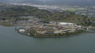 AX0175_0047 - 6K aerial stock footage of a view of San Quentin State Prison from the water, California