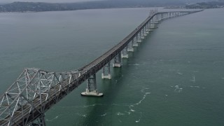 AX0175_0052 - 6K aerial stock footage of light traffic on the Richmond Bridge, California