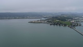 AX0175_0055 - 6K aerial stock footage of flying toward toward San Quentin Prison from the Richmond Bridge, California