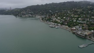 6K aerial stock footage of Sausalito's coastal neighborhoods on a foggy day, California Aerial Stock Footage | AX0175_0065