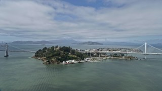 6K aerial stock footage of flying by Yerba Buena Island in San Francisco Bay, California Aerial Stock Footage | AX0175_0112