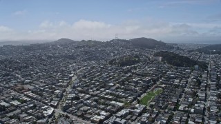 6K aerial stock footage of flying over urban neighborhoods toward Sutro Tower, San Francisco, California Aerial Stock Footage | AX0175_0119