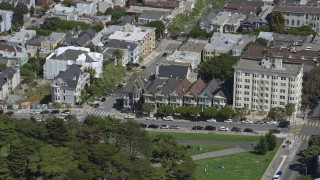 AX0175_0140 - 6K aerial stock footage of the Painted Ladies by Alamo Square, Western Addition, San Francisco, California