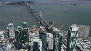 6K aerial stock footage of Downtown San Francisco and the nearby Bay Bridge, California Aerial Stock Footage | AX0175_0156